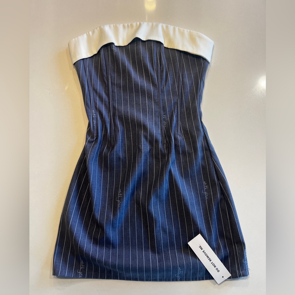 With Jéan Chloe Corset Dress in Pin Me. Brand new with tags!
